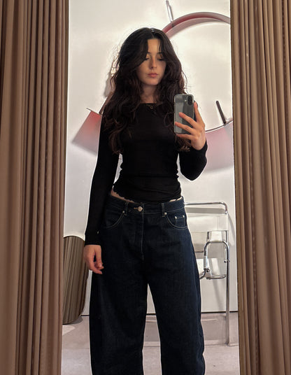 Girl wearing black long sleeve made of silk