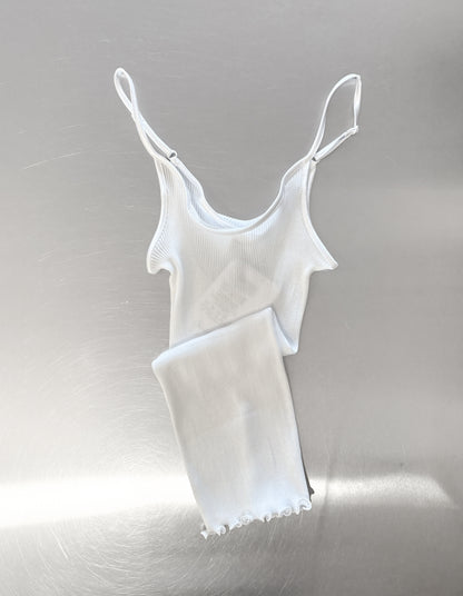 White Ribbed Singlet laid on table