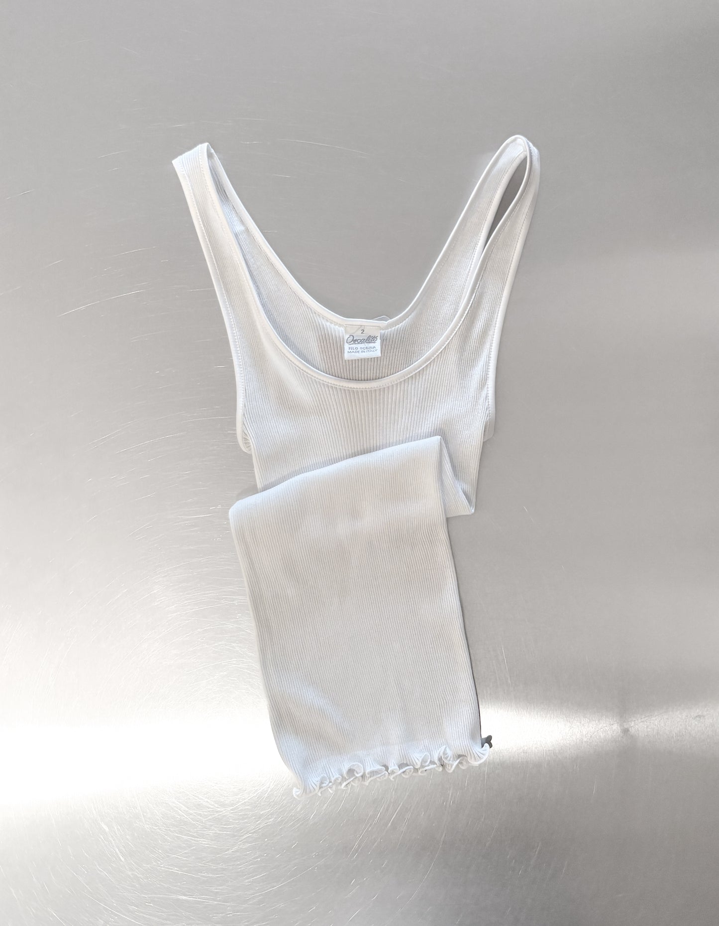 White Singlet on table