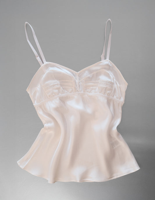 White Cami with white straps on a metal table