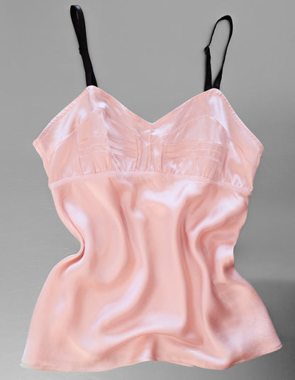 Pink satin camisole on a gray background